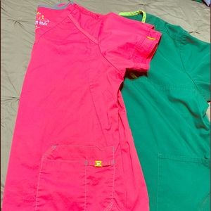 Set of two wink scrub tops.